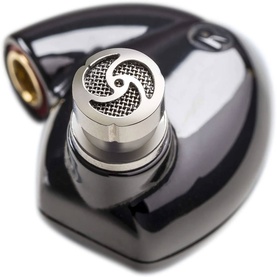 Harman Kardon Planar In-Ear Headphones close-up showing dark grey gloss earpiece with silver mesh vent and gold connector port.