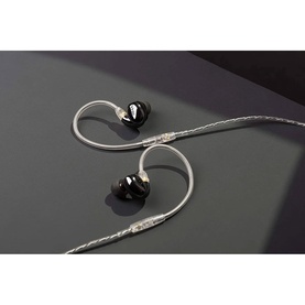 Harman Kardon Planar In-Ear Headphones with black earpieces and silver twisted cable, on grey surface