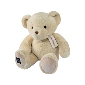 Dou Dou cream plush teddy bear with brown nose, branded tag, and soft paw pads, medium size, seated pose