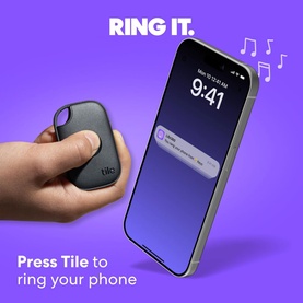 Tile by Life360 Pro Bluetooth Tracker in black, held in hand next to a smartphone displaying a ring alert notification.