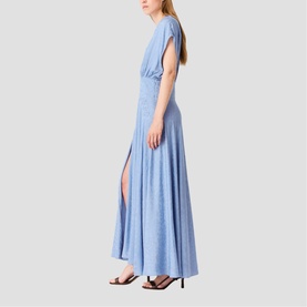 Model wearing light blue maxi dress with short sleeves, gathered waist, and side split, styled with black heeled sandals