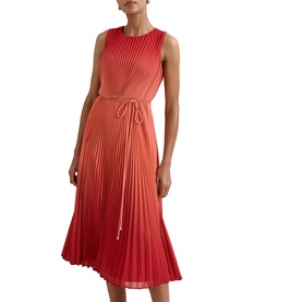 Model wearing Phase Eight red ombre pleated sleeveless midi dress with tie waist belt, transitioning from coral to deep red