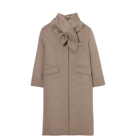 Claude Pierlot wool-blend coat in clear beige with oversized bow collar detail, flap pockets, and relaxed longline silhouette