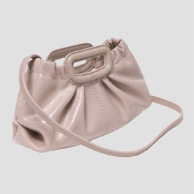 Maje mastic beige patent leather mini bag with ruched body, gold-tone ring handle, and detachable crossbody strap
