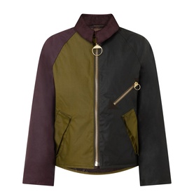 Barbour Golden Olive and Fern colour-block waxed cotton jacket with gold ring zip pull, burgundy raglan sleeves, and asymmetric hem