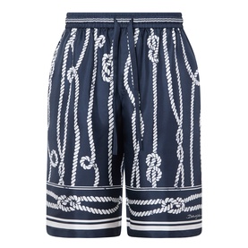 Dolce & Gabbana navy silk shorts with all-over white rope and knot print, elasticated waistband with drawstring tie