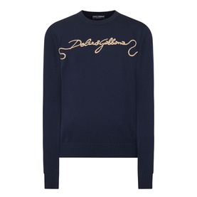 Dolce & Gabbana dark blue wool sweatshirt with gold embroidered script logo on chest, crew neck, long sleeves