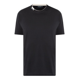 Dolce & Gabbana Logo Tab T-Shirt in black cotton with short sleeves, crew neck, and contrasting white logo tab detail at neckline.
