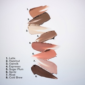 Est&eacute;e Lauder The Essential Eyeshadow Stick shade range swatch chart showing 8 shades from Latte to Cold Brew in neutral tones