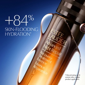 Est&eacute;e Lauder Advanced Night Repair Recovery Treatment Lotion bottle with +84% skin-flooding hydration claim on blue background.