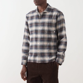 Model wearing Farah Vintage Dark Brown check cotton casual shirt with chest pocket, styled with brown corduroy trousers