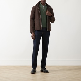 Model wearing Farah Vintage Rosemary Marl Half Zip, styled with a brown jacket, dark navy jeans and black leather shoes.