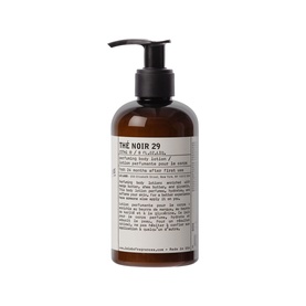 Le Labo Th&eacute; Noir 29 Perfuming Body Lotion in a dark amber glass pump bottle with black cap