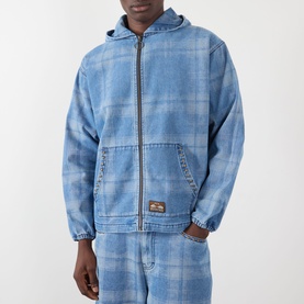 Model wearing Pleasures Logo Check Denim Zip Hoodie in blue with matching check denim trousers.