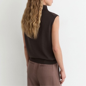 Model wearing Reiss chocolate brown sleeveless high-neck top, styled with taupe wide-leg trousers, back view shown.