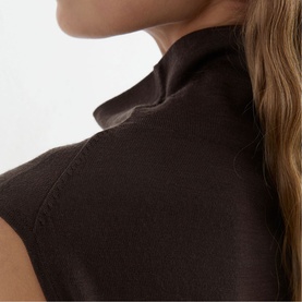 Model wearing Reiss chocolate brown knit top, close-up of ribbed funnel neckline and cap sleeve detail
