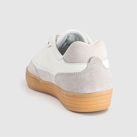 Nike trainer in sail white suede and leather upper with gum rubber sole, rear three-quarter view