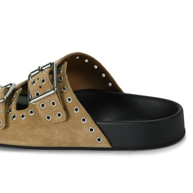 Steve Madden brown suede slide sandal with double silver buckle straps, eyelet stud detail, and black flatform sole