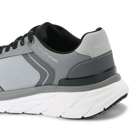 KG by Kurt Geiger grey men's trainer with mesh upper, dark overlays, black tongue, and white chunky sole, close-up angle