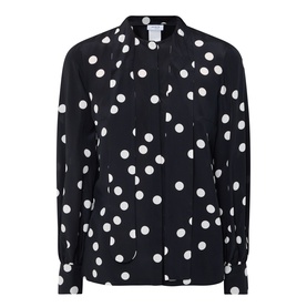 Akris Punto black-cream polka dot blouse with button placket, tie neck detail, and long sleeves