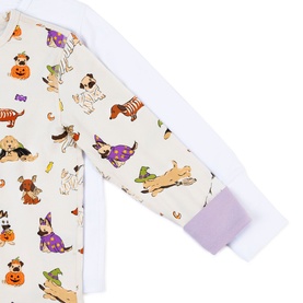 Chelsea Peers Halloween Dogs Multi children's nightwear, cream fabric with illustrated dogs in costumes print and lilac cuffs detail