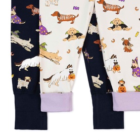 Chelsea Peers Halloween Dogs Multi children's nightwear cuffs detail, showing navy and cream fabric with Halloween dog print and lilac trim.