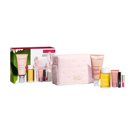 Clarins beauty gift set with pink quilted pouch, cleanser, moisturiser, facial oil, lip gloss, and mascara, displayed with box