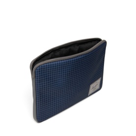 Herschel Laptop Case in Grid Naval Academy, navy blue grid-print with silver zip and logo patch detail.