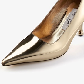 Jimmy Choo gold metallic pointed-toe pump with kitten heel, mirror-finish leather upper, close-up detail shot.