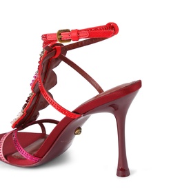 Kurt Geiger London pink strappy heeled sandal, rear view showing stiletto heel, ankle strap with gold buckle, and jewel embellishments
