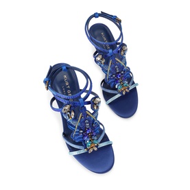 Kurt Geiger London blue strappy flat sandals with multicoloured gemstone embellishments and ankle strap, overhead view