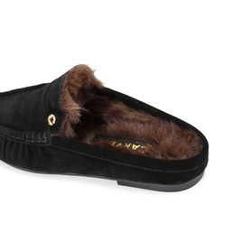Carvela black suede moccasin slipper with brown faux-fur lining and gold logo stud detail, angled sole view