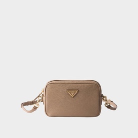 Prada Accessories powder saffiano leather crossbody bag with gold-tone triangle logo hardware and adjustable strap