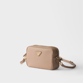 Prada Accessories powder nylon camera bag with gold-tone triangle logo hardware and adjustable crossbody strap, zip closure