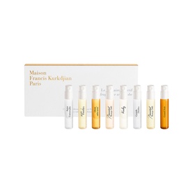 Maison Francis Kurkdjian fragrance set with eight miniature vials in clear and amber glass, presented in a white gift box