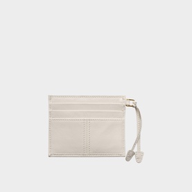 Prada Accessories white leather card holder with multiple card slots and gold-tone zip pull detail