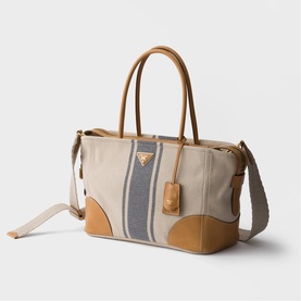 Prada Accessories neutral canvas and tan leather tote bag with grey stripe detail, gold triangle logo, double handles and crossbody strap