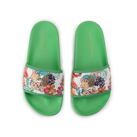 Kurt Geiger London slides in white with vibrant fruit print strap and green sole, top-down view