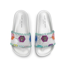 Kurt Geiger London multi-coloured hexagon patchwork slide sandals with white sole and whipstitch detailing, top-down view