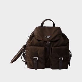 Prada Accessories brown nylon backpack with silver-tone buckles, front pockets, and leather trim detailing