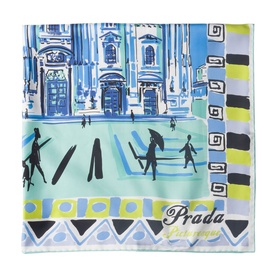 Prada silk pocket square in blue and mint, featuring illustrated cityscape with figures, yellow geometric border, and Prada Palermo script