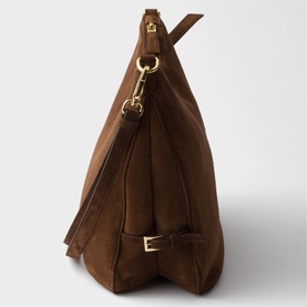 Prada Accessories brown suede hobo bag with gold-tone hardware, tassel detail, buckle strap, and adjustable shoulder strap, side view