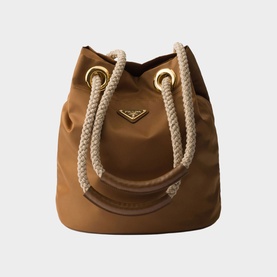Prada Accessories brown nylon bucket bag with rope handles, gold-tone eyelets and signature triangle logo hardware