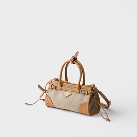 Prada Accessories neutral canvas and tan leather mini tote bag with gold-tone triangle logo, dual top handles and drawstring details
