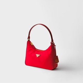 Prada Accessories red nylon mini shoulder bag with gold triangle logo and single top handle