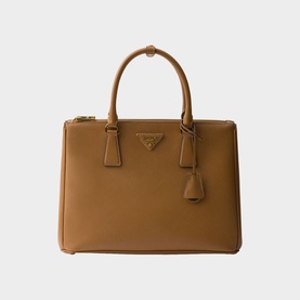 Prada Accessories brown structured tote bag with twin top handles, gold triangle logo, tassel zip pulls and zip closure