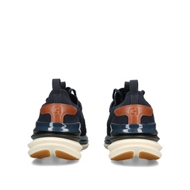 Cole Haan blue men's trainers, rear view, navy textile upper with tan leather heel detail and chunky cream sole