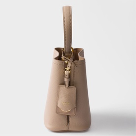 Prada Accessories powder structured tote bag, gold-tone hardware, top handle, detachable charm tag, side profile view