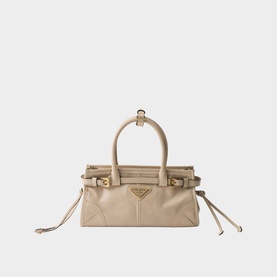 Prada Accessories neutral leather handbag with twin top handles, gold-tone triangle logo hardware and side drawstring ties
