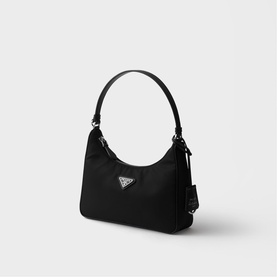 Prada Re-Edition 2000 mini nylon bag in black with silver-tone triangle logo and single top handle